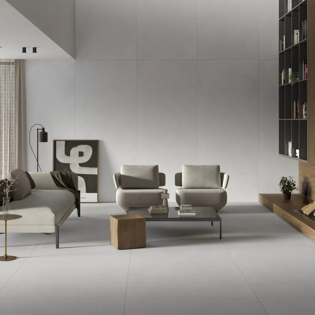 Salón con pavimento y revestimiento Bleuemix blanco y gris, vista amplia