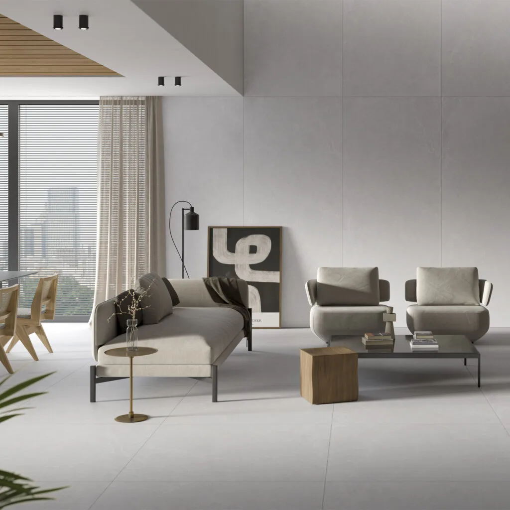 Salón luminoso con pavimento porcelánico Bleuemix gris claro y sillones
