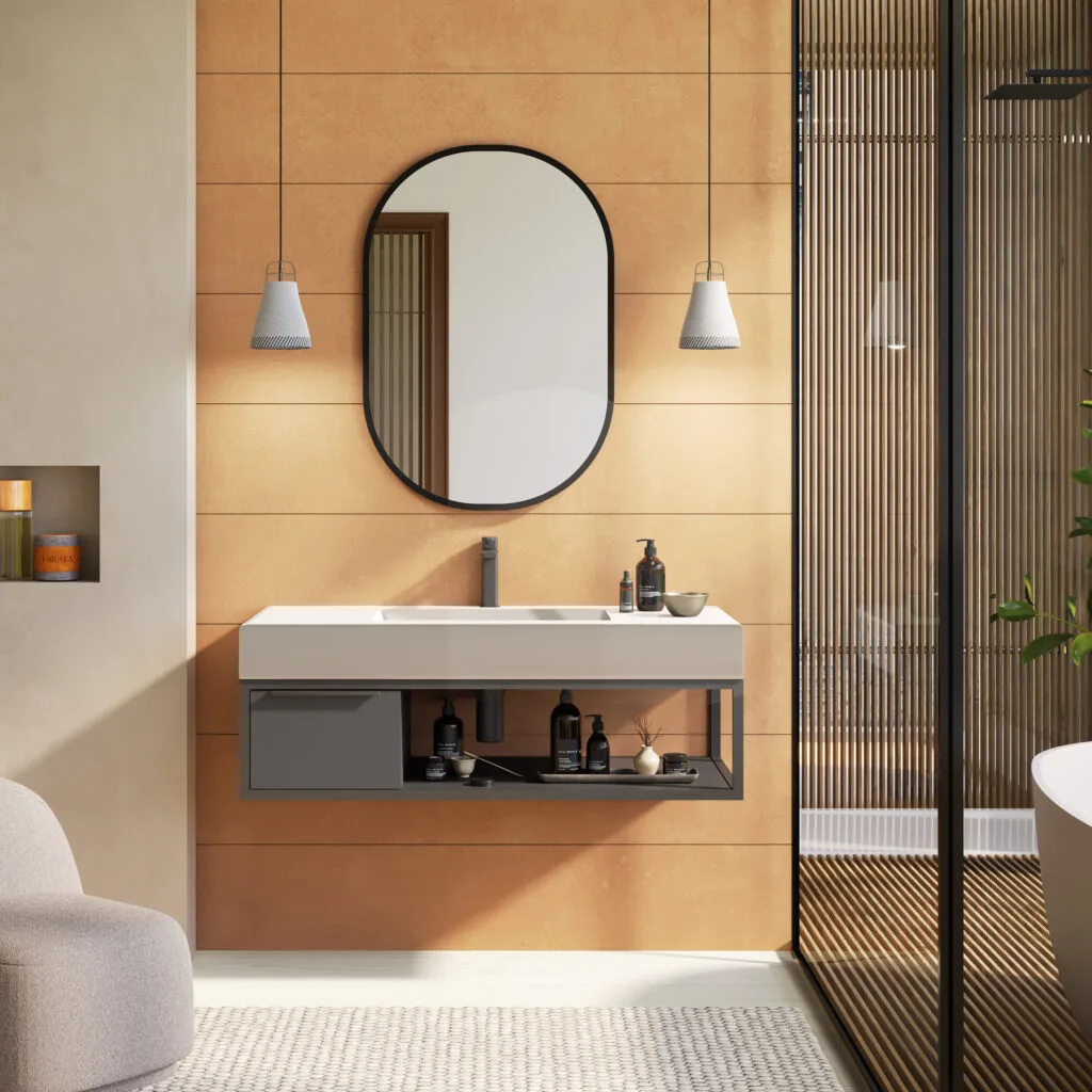Mueble de lavabo Spok suspendido con espejo ovalado negro y pared terracota